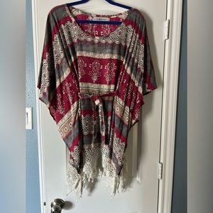 Multicolored/patterned Angel wing sleeved blouse.